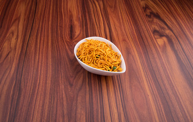 murukku or traditional indian snack chakli and chakali on background.