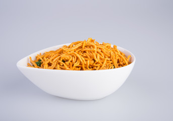 murukku or traditional indian snack chakli and chakali on background.