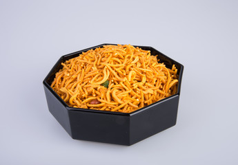 murukku or traditional indian snack chakli and chakali on background.