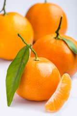 Ripe mandarin close-up on a white background. Tangerine orange. Colorful Food and drink still life concept. Fresh fruits. Clementine. Citrus. Diet. Vitamins. Healthy food.