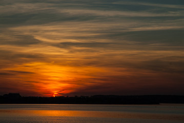 Naklejka na ściany i meble beautiful sunset sky over bucharest lake lacul morii