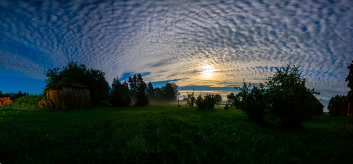 Obraz premium Night field landscape. Fog over the meadow. Full moon shine. Panorama.