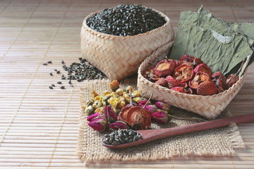 mixture of dried lotus leaf, red rose, hawthorn, cassia seed and chrysanthemum for chinese slimming tea.