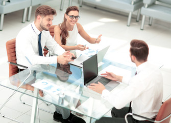 Fototapeta premium Business people working around table in modern office