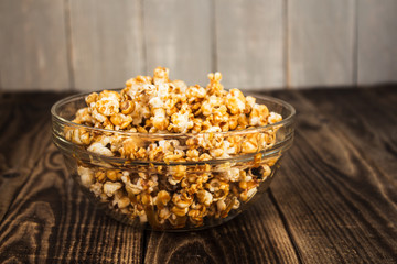 caramel popcorn in the clear bowl