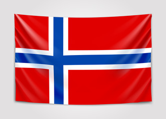 Obraz premium Hanging flag of Norway. Kingdom of Norway. National flag concept.