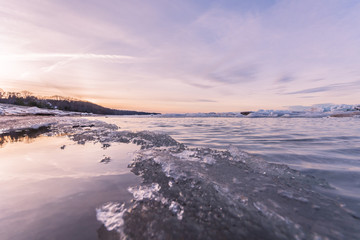 Fototapeta premium Winter landscape. Sea covered blocks of ice.
