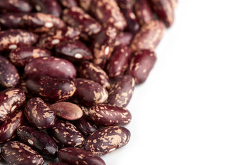 Dark Spotted kidney bean isolated on white background. Dark kidney bean texture background. A large bean with a subtle sweet flavor and soft texture. Beans. Proper nutrition. Vitamins. Healthy food.