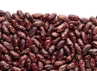 Dark Spotted kidney bean isolated on white background. Dark kidney bean texture background. A large bean with a subtle sweet flavor and soft texture. Beans. Proper nutrition. Vitamins. Healthy food.
