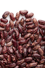 Dark Spotted kidney bean isolated on white background. Dark kidney bean texture background. A large bean with a subtle sweet flavor and soft texture. Beans. Proper nutrition. Vitamins. Healthy food.