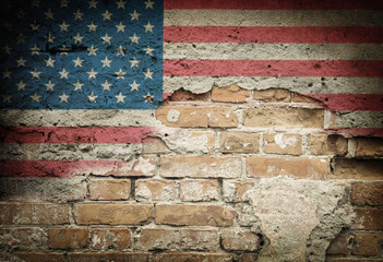 Grunge USA flag on brick wall background