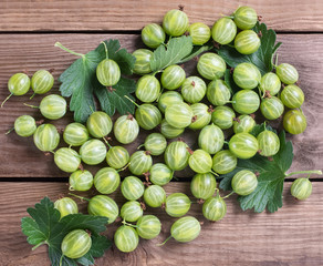 Gooseberries fresh berries on a wooden table.