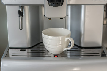 Green field at dusk with fog or mist. Nature landscape panorama.