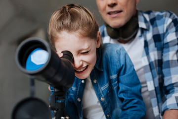 Cute pretty girl using optical equipment © Viacheslav Yakobchuk