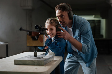 Pleasant supportive father giving advice to his daughter