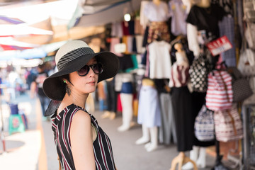 woman traveling and shopping