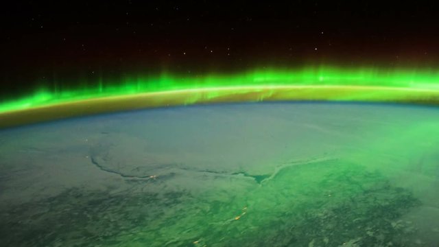 International Space Station (ISS) shot showing the Aurora Borealis over Canada. Video treatment from source stills courtesy of NASA.
