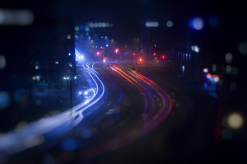 Fototapeta na wymiar night traffic in the city, light trace from traffic 