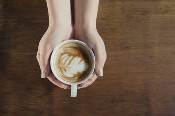 Lonely woman drinking coffee in the morning