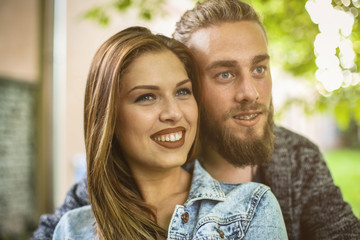 Fototapeta premium Couple holding hands outdoors.