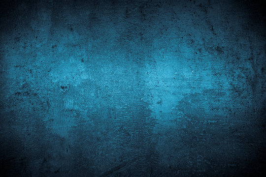 Dark blue monochrome slate background.
