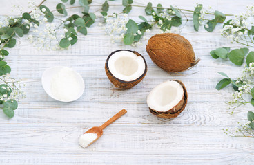 Still life with coconut and coconut flakes, healthy food concept