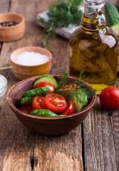Salad of fresh tomato, cucumber and olive oil