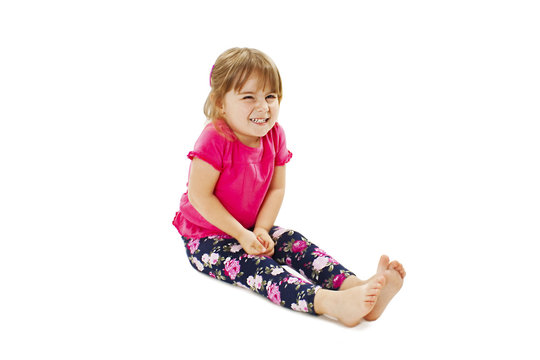 peessing littele girl  