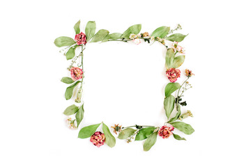 Round frame wreath pattern with roses, pink flower buds, branches and leaves isolated on white background. Flat lay, top view