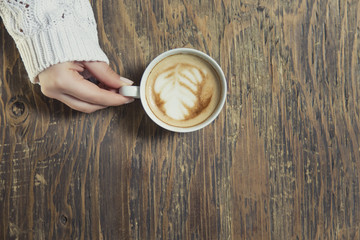 Lonely woman drinking coffee in the morning