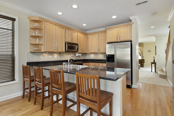 Kitchen with oak wood cabinetry