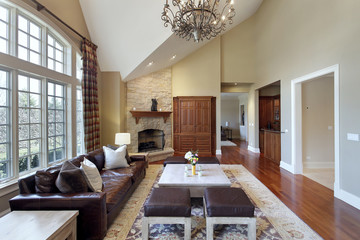 Living room with stone fireplace
