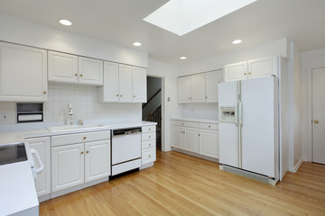 Kitchen with white cabinetry