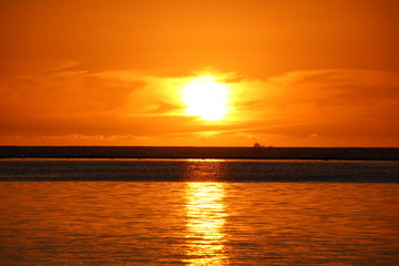 Fototapeta na wymiar Sunset / Sunset at the beach of Flic en Flac, Mauritius, Indian Ocean, Africa Africa.