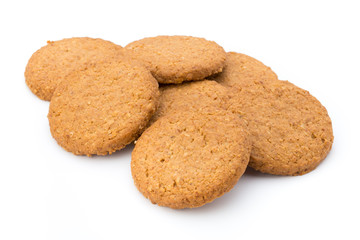 Stacked short pastry cookies isolated on white background.