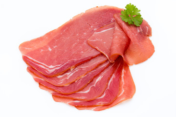 Pork ham slices isolated on white background.