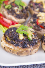 Stuffed champignons with eggs, cheese and paprika.