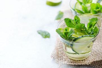 Cucumber lime mint fresh infused water detox drink cocktail lemonade