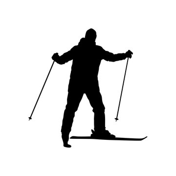 Silhouette of a skiing man