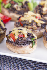 Stuffed champignons with eggs, cheese and paprika.