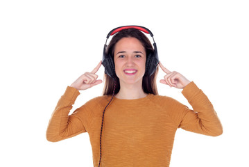 Happy teenager girl with headphones listening music