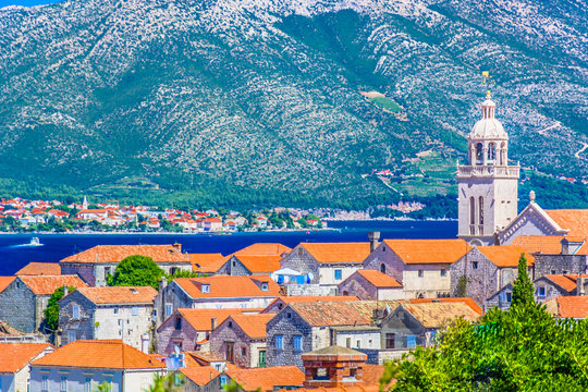 Korcula town. / Aerial view on Korcula town with Orebic place on peninsula Peljesac, Southern Croatia, Europe.