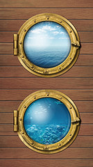 Two ship windows with ocean surface and underwater deep