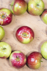 tasty apples on a wooden background
