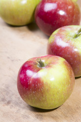 tasty apples on a wooden background
