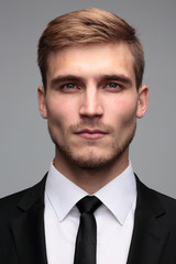 Close-up portrait of a successful handsome business man