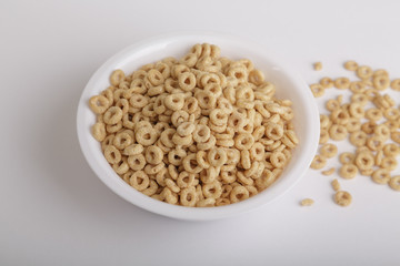 Toasted Oat Cereal in White Bowl