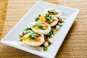 medium-boiled eggs with salad