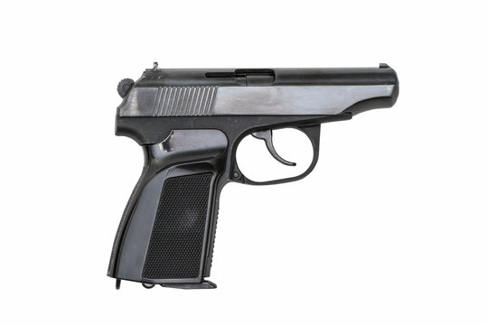 Black used pistol on white background
