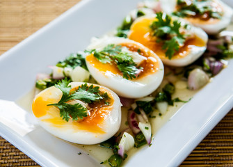 medium-boiled eggs with salad